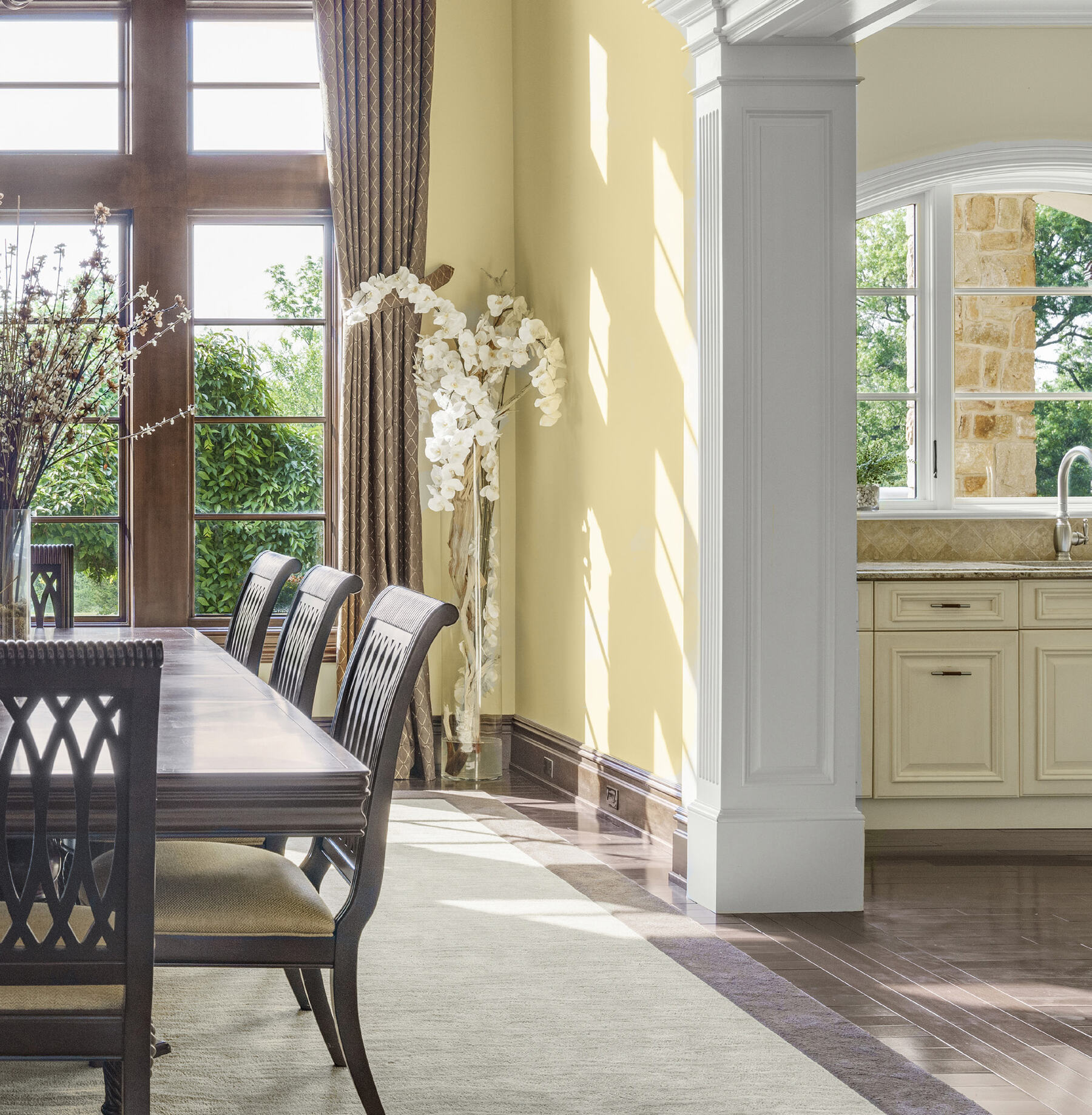 Wall of oversized windows in the breakfast room at 1315 Canal Road, Princeton