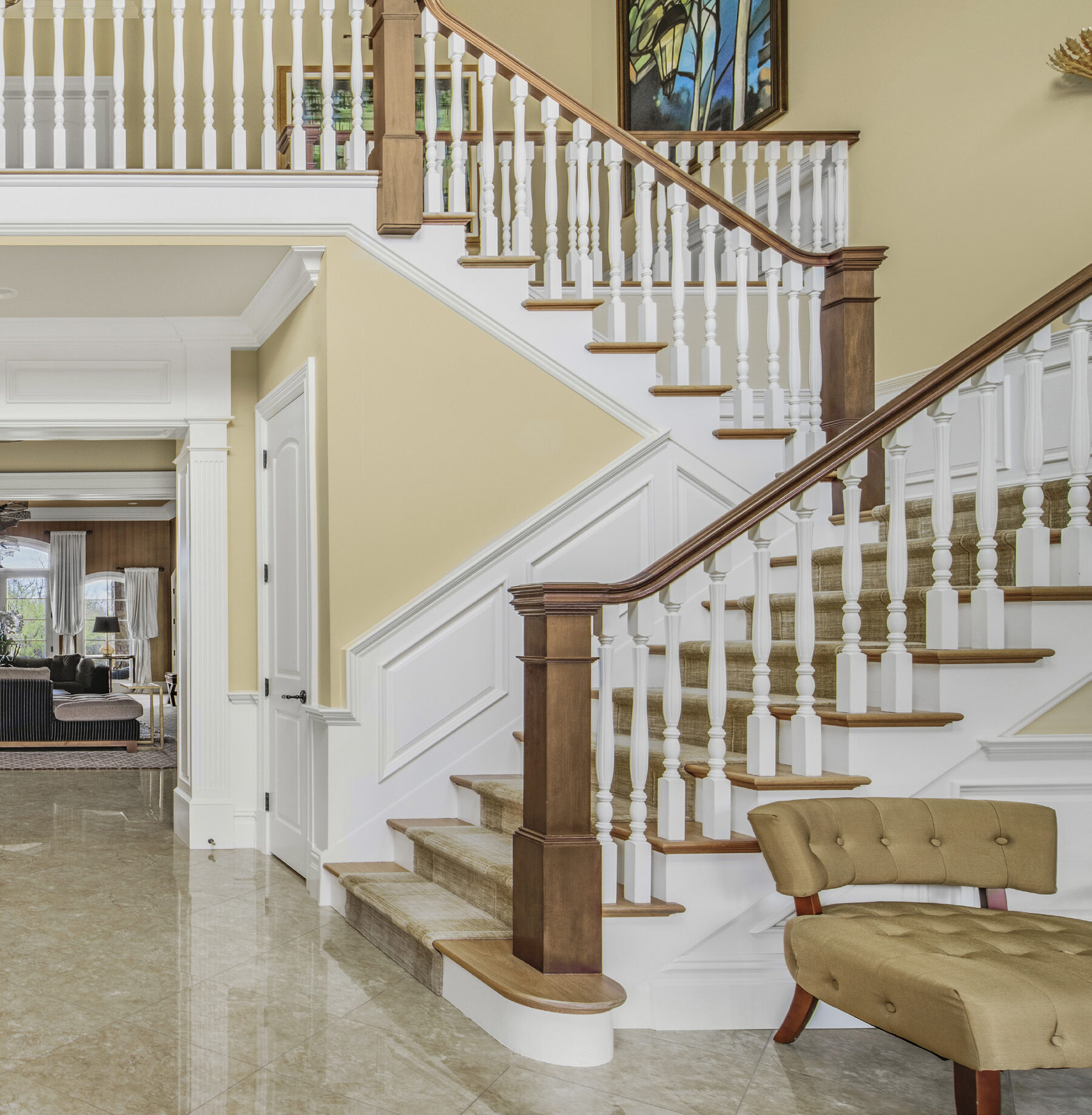 Millwork and stair detail in the foyer at 1315 Canal Road, Princeton