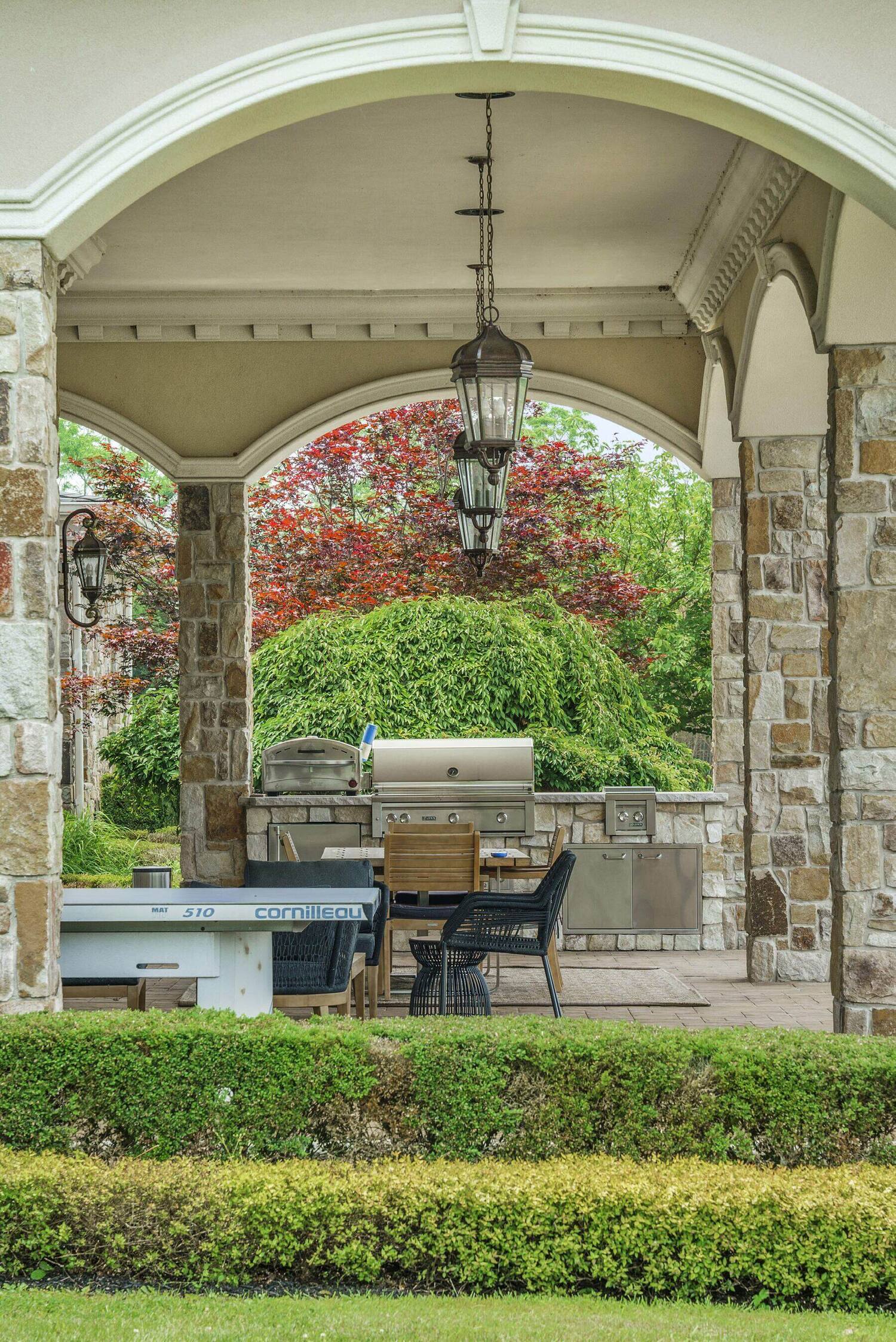 covered loggia and outdoor kitchen at The Princeton Preserve